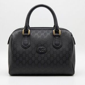 GUCCI Gucci Signature leather bowling bag
$1,690